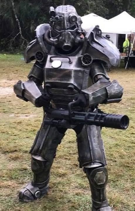 Brotherhood of Steel soldier in dark power armor with minigun