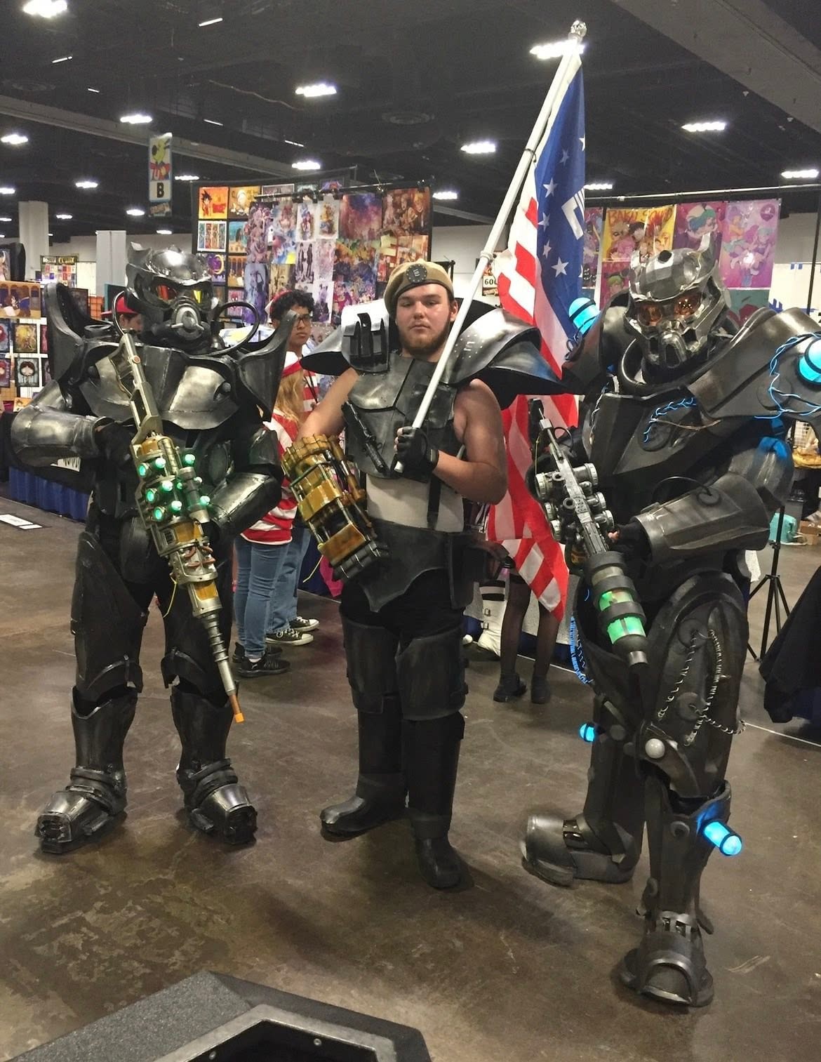 Enclave members with American flag at a convention