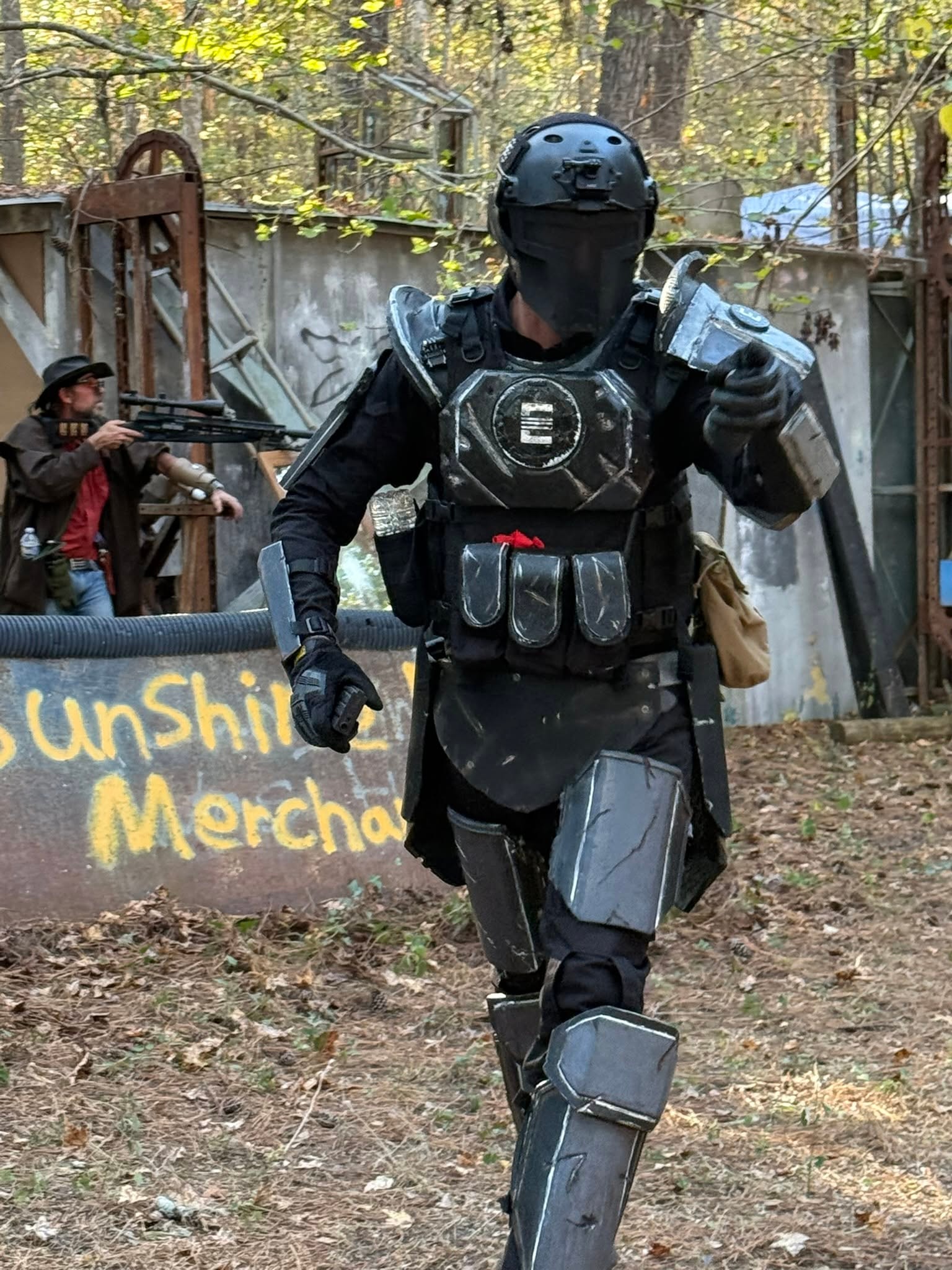 Enclave soldier in black armor advancing at a MindGame Productions event