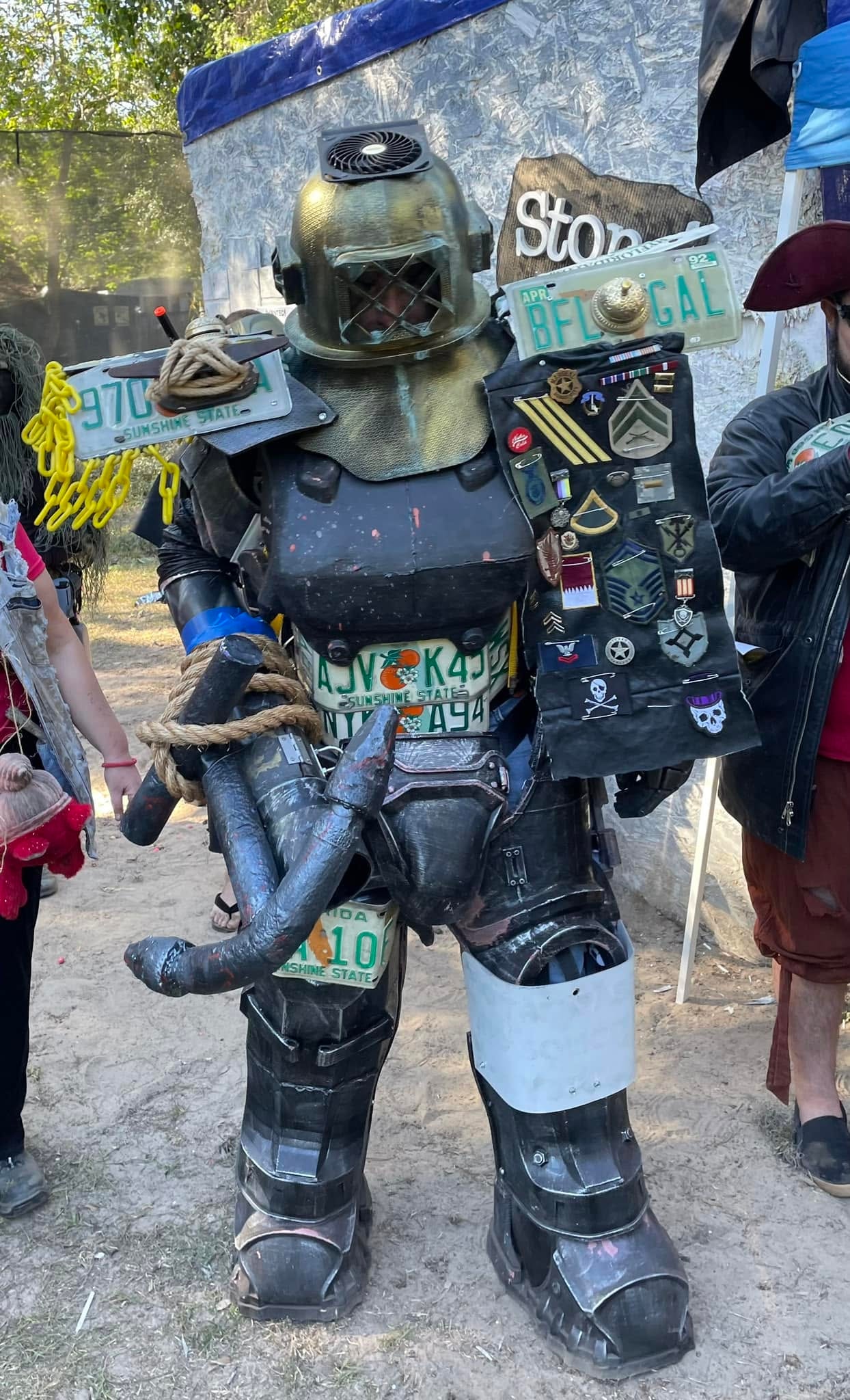 Ravager in elaborate salvaged armor covered in Florida license plates